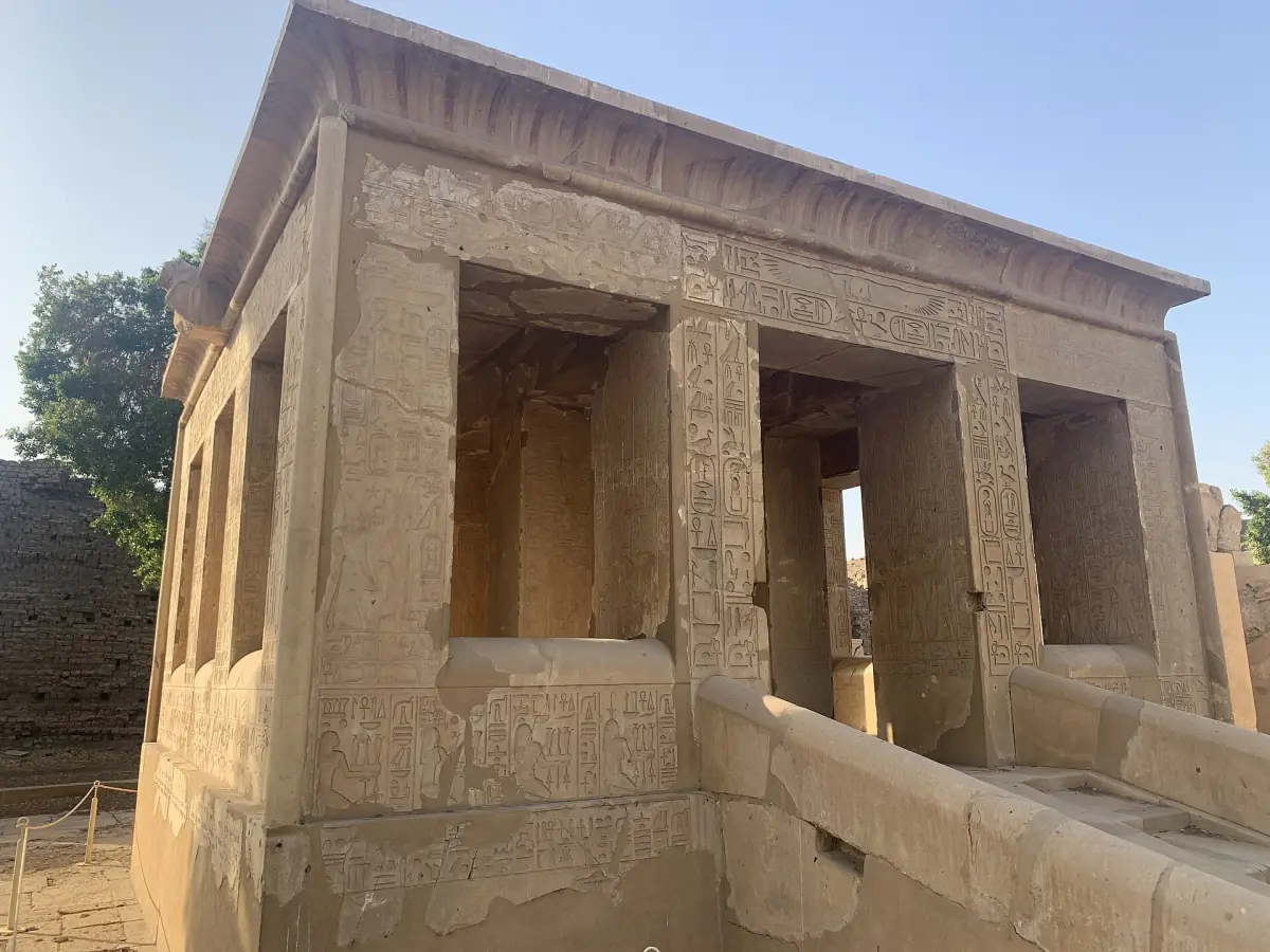 Side view of the White Chapel with square pillars and a sloping ramp